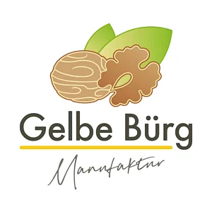 Logo Manufaktur Gelbe Bürg Bild von gezeichneter Walnuss mit Kern und Blatt. Darunter Schriftzug in Schwarzer Farbe Gelbe Bürg.